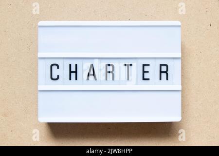 Lightbox with word charter on wood background Stock Photo