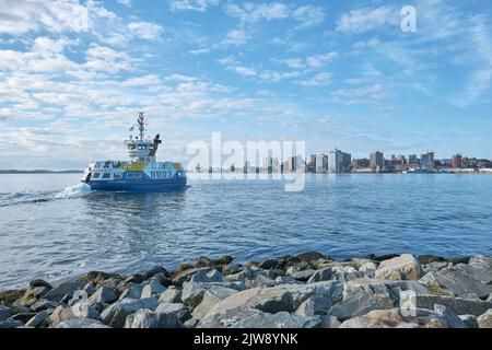 Operated by the Halifax Transit Authority, ferries transport passengers between Dartmouth and Halifax Nova Scotia on a regular schedule.  Here a ferry Stock Photo