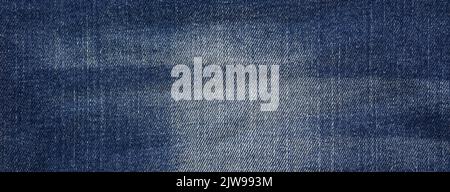 Photo of dark blue jeans fabric, detailed denim background, texture Stock Photo
