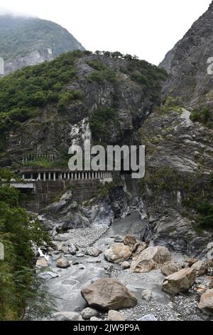 A vertical of the road tunnel on mountainside at Tianxiang Recreation Area in Xiulin Township,Taiwan. Stock Photo