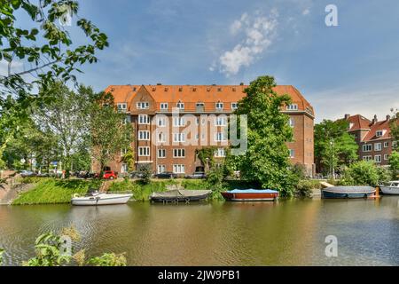 View of street near building with beauty of vegetation outside Stock Photo