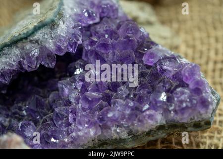 purple gem amethyst mineral clear quartz gem stone Stock Photo