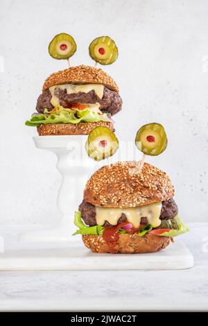 Halloween burger in shape of scary monster Stock Photo