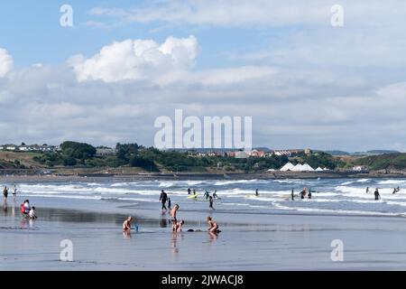 Scarborough, North Yorkshire, UK, September 1  2022 A summer's day view over Scarborough South Bay with holidaymakers enjoying the beach and sea. Stock Photo