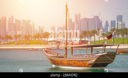 Traditional Fishing boats called dhow at the Qatar Corniche. Stock Photo