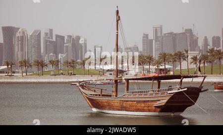 Traditional Fishing boats called dhow at the Qatar Corniche. Stock Photo