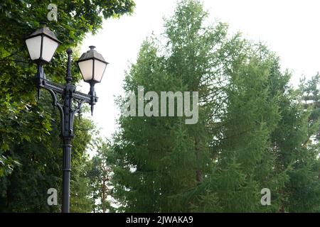 Lamp light city street lantern electricity urban town modern, from illumination background in outdoor for retro metal, single style. Stand gold iron Stock Photo