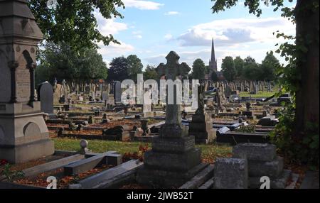 Warrington Cemetery, Manchester Rd, Warrington, Cheshire, England, UK,  WA1 3BG looking over to St Elphins church Stock Photo
