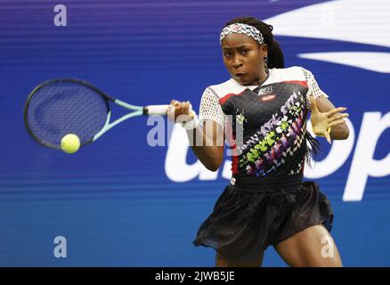 Coco Gauff of the U.S. hits a forehand to Poland's Iga Swiatek in their ...