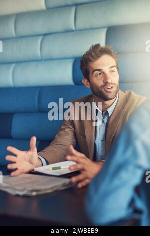 People are his business. a young man having a business meeting in a cafe. Stock Photo