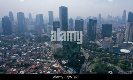 Rows of high-rise buildings are immortalized from a height in Jakarta ...