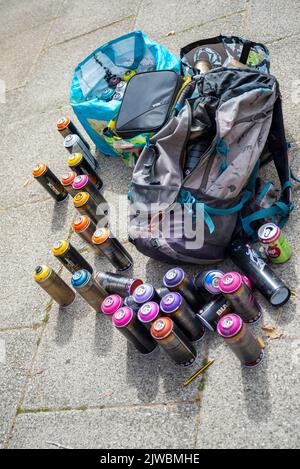 Spray paint cans used in painting graffiti and wall murals Stock Photo ...