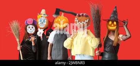 Collage of funny monsters on red background Stock Photo