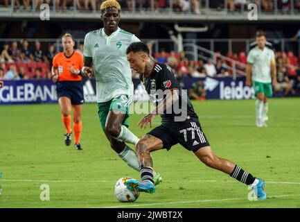 WASHINGTON, DC, USA - 4 SEPTEMBER 2022: D.C. United forward Martin Rodriguez (77) dribbles past Colorado Rapids forward Gyasi Zardes (29) during a MLS match between D.C United and the Colorado Rapids, on September 04, 2022, at Audi Field, in Washington, DC. (Photo by Tony Quinn-Alamy Live News) Stock Photo