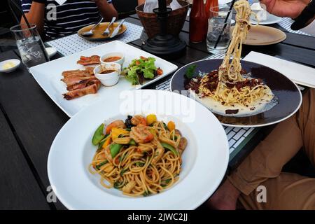 Close up seafood spaghetti in garlic and chili sauce Stock Photo