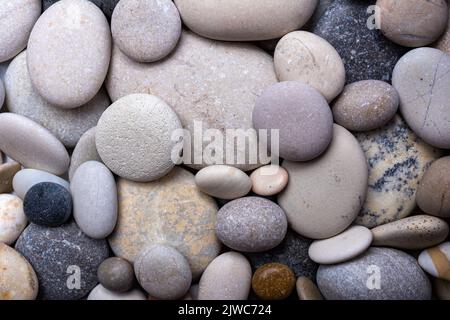 Background or banner with different size grey stones Stock Photo