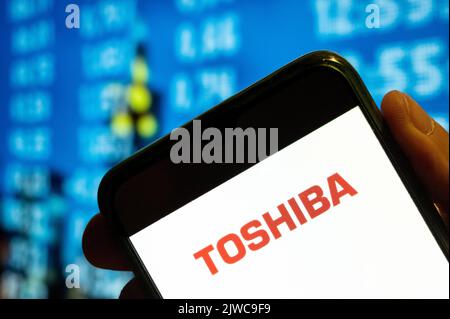 China. 25th July, 2022. In this photo illustration, the Japanese multinational electronics conglomerate Toshiba logo is displayed on a smartphone screen. (Photo by Budrul Chukrut/SOPA Images/Sipa USA) Credit: Sipa USA/Alamy Live News Stock Photo