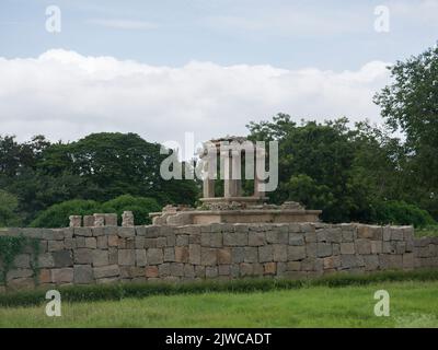 Water pool for public bath and sports near a stepped square water tank at Hampi state Karnataka India 08 07 2022 Stock Photo