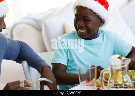 Multi generation african american family in dining room Stock Photo