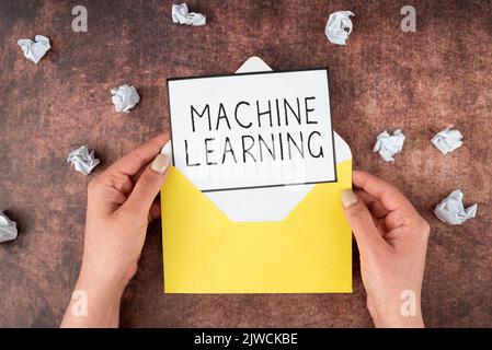 Text showing inspiration Machine Learninggive computers the ability to be taught with data. Conceptual photo give computers the ability to be taught Stock Photo