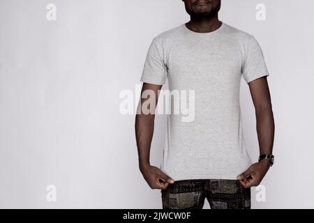 black model wearing a plain grey t-shirt Stock Photo
