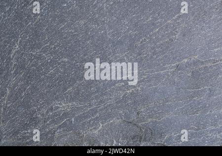 Dark grey slate surface background Stock Photo