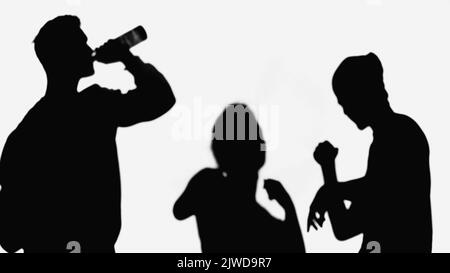 silhouette of man drinking beer near dancing friends isolated on white Stock Photo