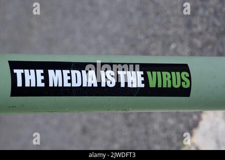 The Media is the Virus Fake News Slogan Stock Photo