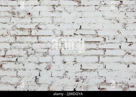 old brick wall white paint grunge background Stock Photo