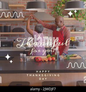 Composition of happy thanksgiving day text over senior african american couple dancing Stock Photo
