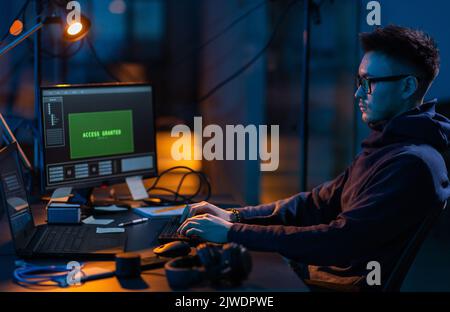 hacker using computer virus for cyber attack Stock Photo