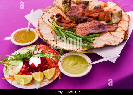 Grilled meats and Tlayudas, Oaxaca, Mexico Stock Photo