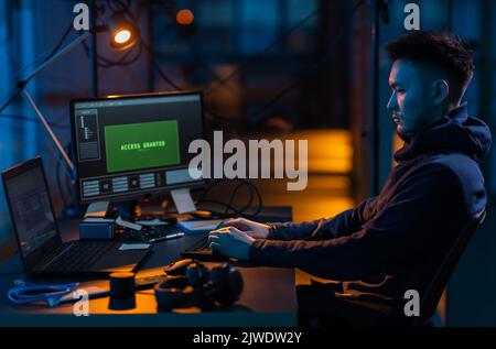 hacker using computer virus for cyber attack Stock Photo