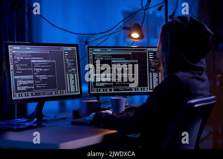 hacker using computer virus for cyber attack Stock Photo