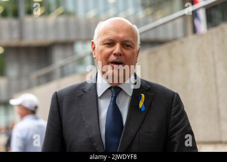 Queen Elizabeth II Centre, Westminster, London, UK. 5th Sep, 2022. Conservative party members and officials are leaving the Centre after choosing Liz Truss as the new leader of the party, and therefore the new Prime Minister. Protesters gathered outside. Iain Duncan Smith MP leaving Stock Photo