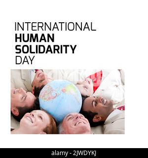 Composite of international human solidarity day text and coworkers lying around globe in office Stock Photo