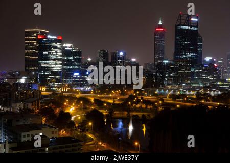 PERTH, WESTERN AUSTRALIA - JULY 15, 2018: Detailed skyline of skyscrapers in Perth, Western Australia at night with Rio Tinto and Woodside building Stock Photo