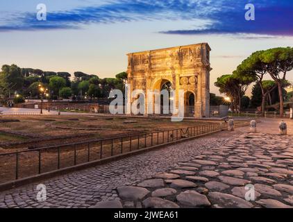 Famous Illuminated Arch of Constantine at sunset, no people, Rome, Italy Stock Photo