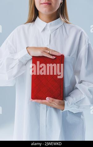 Red notebook for business notes. Women's case notebook Stock Photo