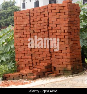A large stack of red bricks Stock Photo