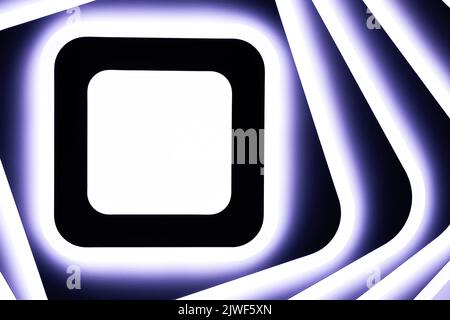 Glowing square and lines. Purple white light LED lamp on the ceiling. Technology abstraction. Backdrop Stock Photo