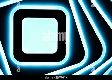Abstract square blue white LED lamp shining brightly on the ceiling. Banner for Advertising. Backdrop Stock Photo
