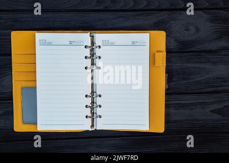 yellow notebook on a paper clip. space for your text or design Stock Photo