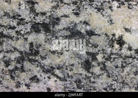 granodiorite from the Baltic Sea coast in Waabs, Germany for background use Stock Photo
