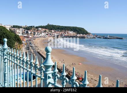 Scarborough, North Yorkshire, UK, September 1  2022 Overlooking old iron railings in Scarborough with the South Bay and town houses in the distance. Stock Photo