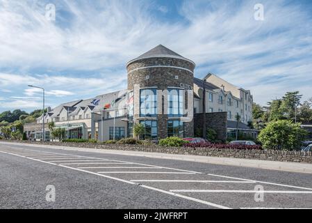 Celtic Ross Hotel, Rosscarbery,Co. Cork Ireland, with its characteristic round tower, overlooking both  a lagoon and a tidal estuary. Stock Photo