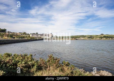 Celtic Ross Hotel, Rosscarbery,Co. Cork Ireland, with its characteristic round tower, overlooking both  a lagoon and a tidal estuary. Stock Photo