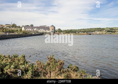 Celtic Ross Hotel, Rosscarbery,Co. Cork Ireland, with its characteristic round tower, overlooking both  a lagoon and a tidal estuary. Stock Photo