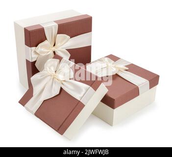 set of three gifts. brown boxes with beige bows isolated on white background Stock Photo