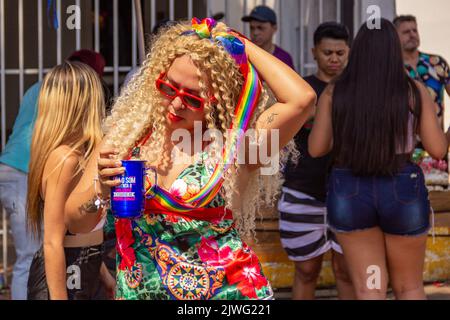 Goiânia, Goias, Brazil – September 05, 2022: A blonde-haired woman dancing during the LGBTQIA+ Pride Parade. Stock Photo
